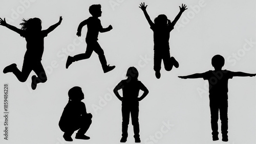 Happy Children Silhouettes Jumping and Playing Isolated on White Background