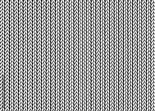A close up view of a tightly woven repetitive black and white textile pattern