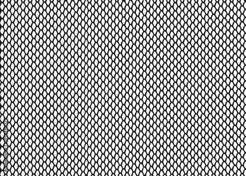 Close up of a black and white woven textile pattern with repeating holes