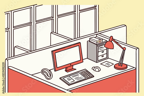 A modern office cubicle with a computer and lamp on the desk