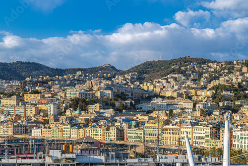 Panoramic view of port of Genoa with colorful houses on italian coastline. Genoa, Liguria, Italy