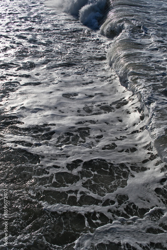 Overhead View of Sea Surface with Crashing Foamy Waves. Aerial Close-Up of Foamy Sea Waves: Textured Sea Surface from Above