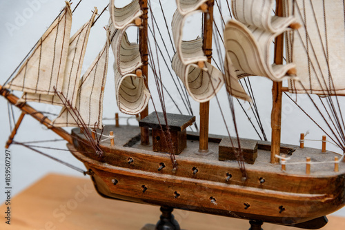 Handcrafted wooden tall ship model, commonly used as nautical home decor. 