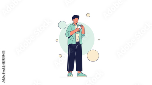 Young man standing and looking at his smartphone with a casual pose and minimal background