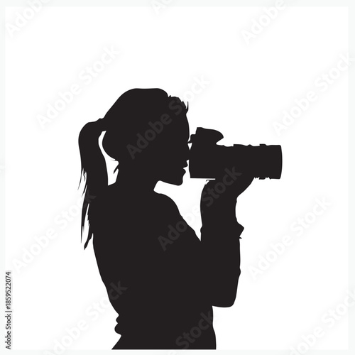 silhouette of a female photographer