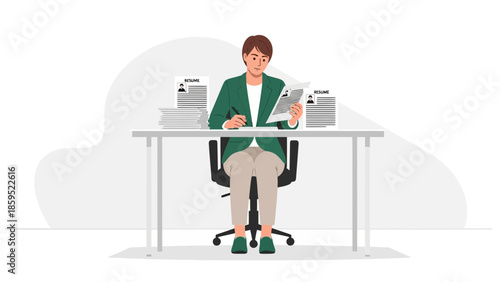 Young professional woman reviewing multiple resumes at her desk during a busy workday