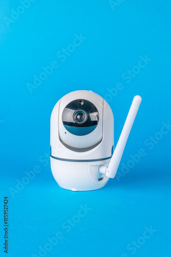 Wallpaper Mural Smart Home Security: Wireless White Surveillance Camera on Blue Background Torontodigital.ca