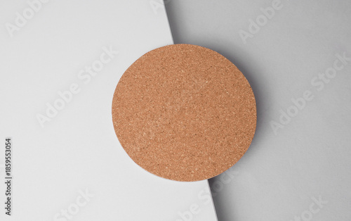 Cork round coaster on a light background