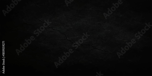 A dark and aged grunge paper texture with a rough stone surface creates a vintage black and gray concrete wall backdrop for a blank dirty material design