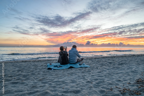 sunrise romantic couple on Corsican coast near Bastia Etang de Biguglia Camping San Daminao Beachside Corse