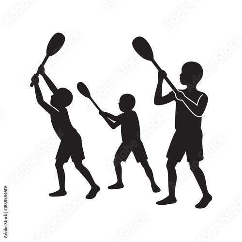 Children Playing With Paddles Outdoor Fun