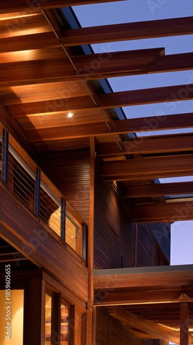 realestate. Modern residential architecture illuminated by warm interior ligh...