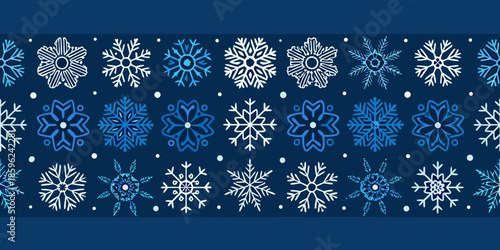 Seamless pattern of delicate snowflakes on a dark blue background