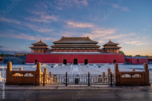 The majestic Taihemen Gate in the Forbidden City, Beijing, captured during sunrise. This ancient architectural marvel showcases traditional Chinese design, history, and grandeur.