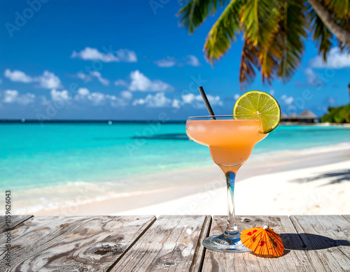 Aesthetic photo of a cocktail by the Caribbean shore 