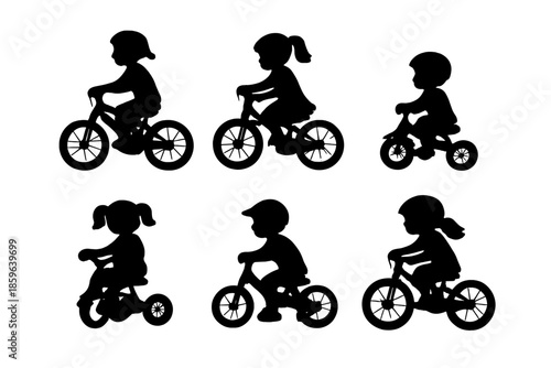 Silhouettes of Children Riding Bicycles