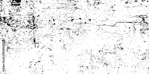 Black and white texture. Distressed grunge background. Abstract textured effect. Abstract noise. Small particles of debris and dust. Distressed uneven grunge texture.
