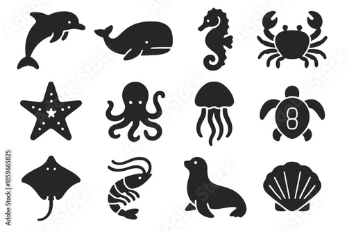 Marine Wildlife Icons. Solid style icons of ocean wildlife: dolphin whale, seahorse crab, starfish octopus, jellyfish turtle,