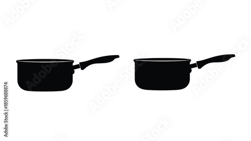 Two black saucepans with handles isolated on a plain white background