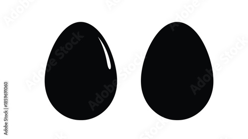 Two glossy black oval shapes isolated on a clean white background
