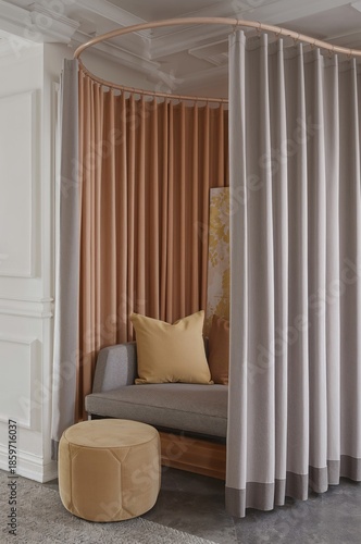 Modern Sitting Space in a Living Room With Soft Curtains and Stylish Decor Ne...