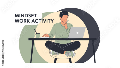 Young man engaging in focused work activity while contemplating mindset and workspace environment