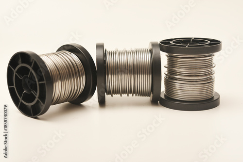 Coils with solder. Plastic coils with tin-lead solder. Materials for electronics repair.