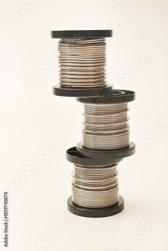 Coils with solder. Plastic coils with tin-lead solder. Materials for electronics repair.