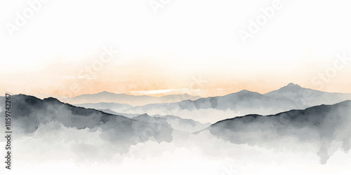 A breathtaking morning view of a misty mountain landscape at sunrise with golden light glowing through clouds and fog over the forest hills and valley