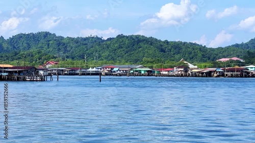 Wallpaper Mural Kampong Ayer is a historic settlement in Bandar Seri Begawan, the capital of Brunei. A village on the water. Kampung Air. Traditional stilt houses built on the Brunei River. 4К Torontodigital.ca