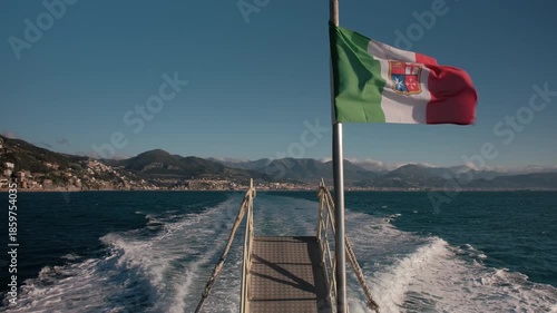 Daytime coastal voyage on the Amalfi Coast with historic maritime flag