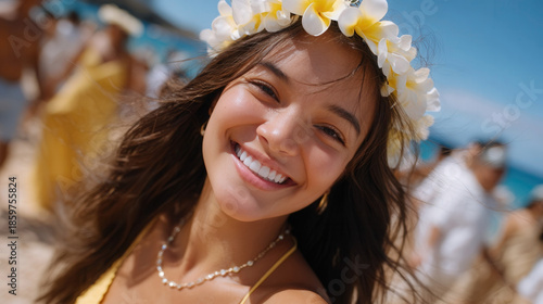 Hawaiian young woman enjoys summer beach party with hula dancing and traditional haku lei