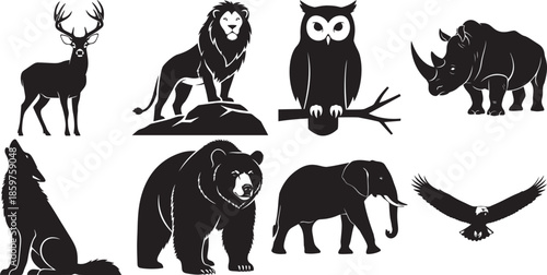 Collection of wild animals vector silhouettes including deer, lion, owl, rhino, wolf, bear, eagle, elephant