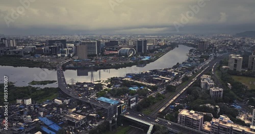 Aerial view of Bandra Kurla Complex (BKC), Mumbai, India, showcasing the city’s prominent financial and commercial district. Beautiful cloudy weather during the monsoon.