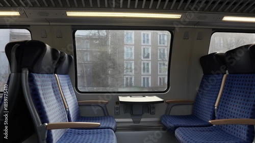 “Empty interior of a passenger train traveling from Berlin to Potsdam, Germany. 4 k video