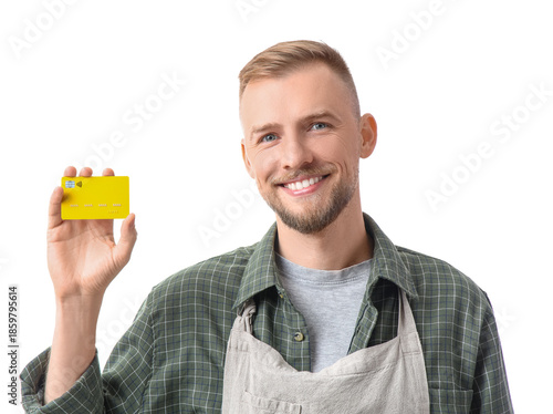Male cashier with credit ca...