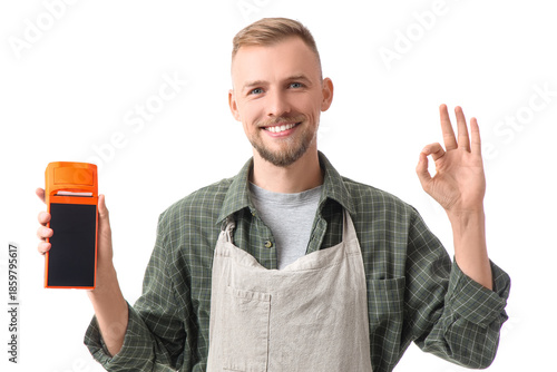 Male cashier with payment t...