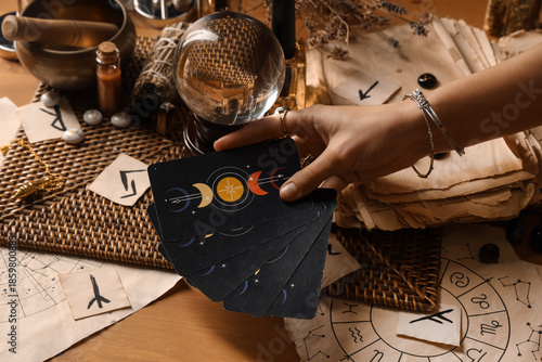Fortune teller with tarot c...