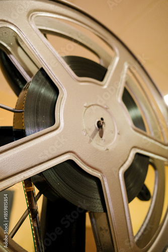 Vintage film reel running on movie projector