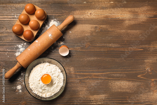Rolling pin with bowl of fl...