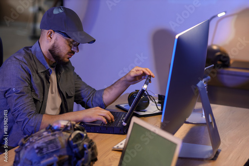Young soldier working with ...