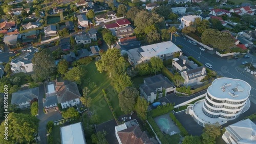 Aerial view of a residential neighborhood in Remuera, Auckland, New Zealand. The photo shows houses, trees, and streets, capturing the urban landscape and residential architecture.