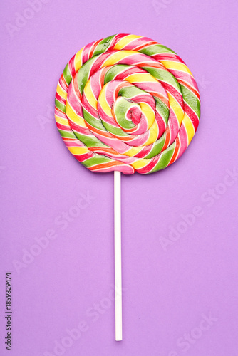 Colorful lollipop on purple...