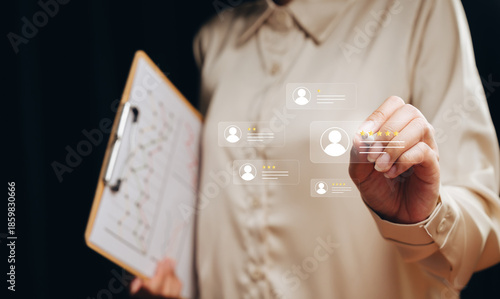 Customer feedback concept. Businesswoman selecting five star rating with review icons, service evaluation, satisfaction measurement, reputation management, user experience
