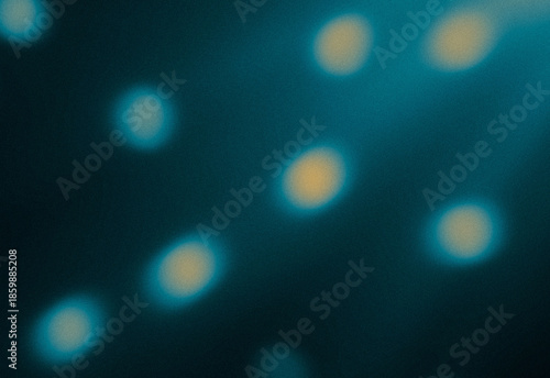 Картината върху платно Abstract blue bokeh glow background featuring soft circle orbs and dreamy lighti