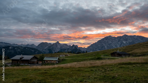 sunset at Gotzenalm mountain hut with Mt. Watzmann, Berchtesgaden national park, Bavaria, Germany