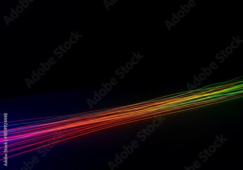 Abstract background illustrating optical physics with vibrant color bands dispersing across a dark surface, representing light waves, energy, physics, ray