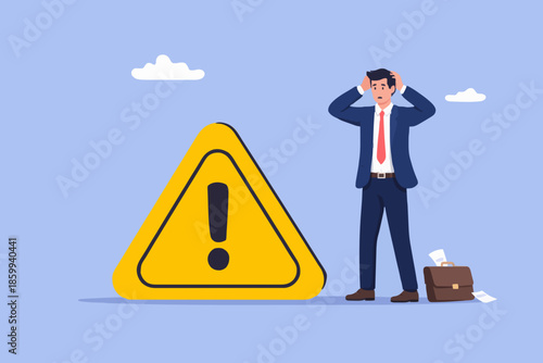 Business Man With Warning Sign