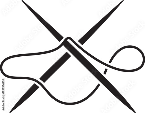 Crossed knitting needles threaded with yarn creating an elegant sewing tool symbol