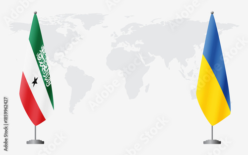 Somaliland and Ukraine flags for official meeting against background of world map.